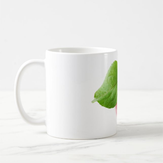 Rött äpple ovanifrån kaffemugg (Vänster)