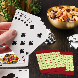 Rött blommönster på ljust grön bakgrund casinokort