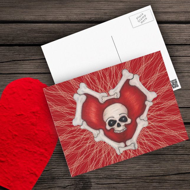 Rött gotiskt hjärta med benvit hud på Linjer Vykort (Gothic red heart outlined in white bones with skull on red with spidery lines on postcard.)