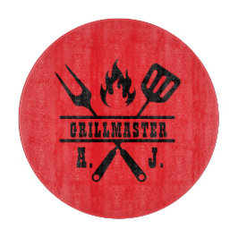 Rött grillmästarredskap