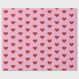 Rött hjärta på rosa bakgrund Inpackningspapper kär Presentpapper