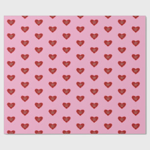 Rött hjärta på rosa bakgrund Inpackningspapper kär Presentpapper