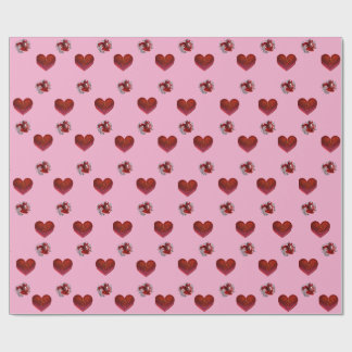 Rött hjärta på rosa bakgrund Presentpapper kärlek