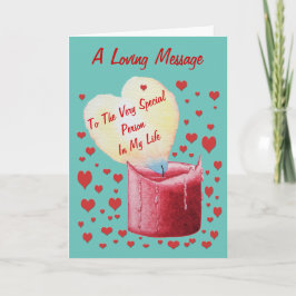 Rött hjärtformat flamljus med kärlek-versa kort