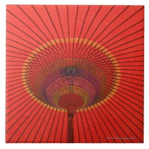 Rött paraply kakelplatta