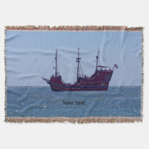 Rött piratskepp på havet filt