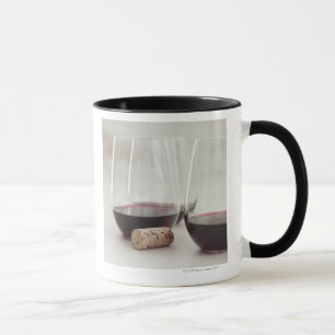 Rött vin i stemless exponeringsglas mugg