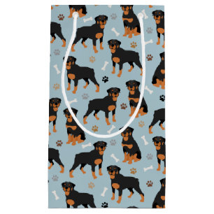 Rottweiler Hund Bones och Tass