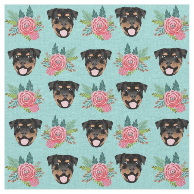 Rottweiler hundar mynta och rosa blommigt tyg (Närbild)