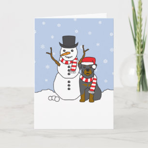 Rottweiler och snögubbe helgkort