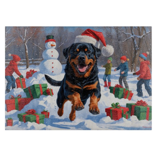 Rottweiler springer i Snö med julklapp (Framsidan)