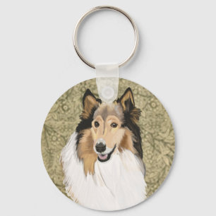 Rough Collie på en brun blommig bakgrund Nyckelring