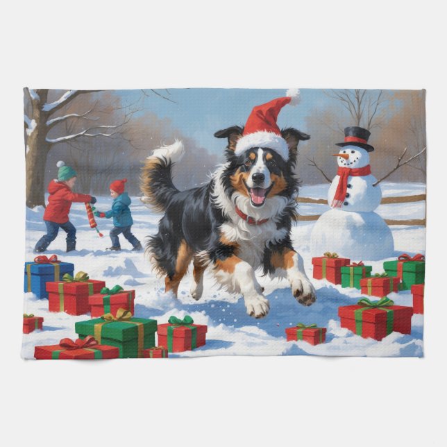 Rough Collie springer i snö med julhatt Kökshandduk (Horisontell)