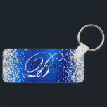 Royalet Silver Blue Foil Finare Monogram Nyckelring<br><div class="desc">Elegant silver glitter med gnistor mot en faux klassisk kobolt eller royal blå fläckbild av metall med borstad kant. Det går att anpassa kalligrafimonogrammet för svart och vitt finare i mitten. Du kan t.ex. ta bort namn och bara lämna ett monogram. All sparsam och glansig inslag i denna moderna gigantiska...</div>