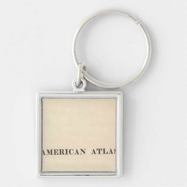 Rubrik Sidan American Atlas Fyrkantig Silverfärgad Nyckelring (Framsidan)