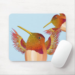 Rufous Hummingbird på en musknapp Musmatta