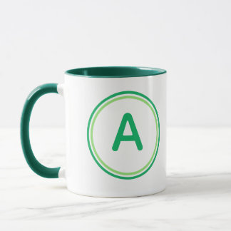 Rund bokstavsalfabet Grön cirkeldesign Mugg