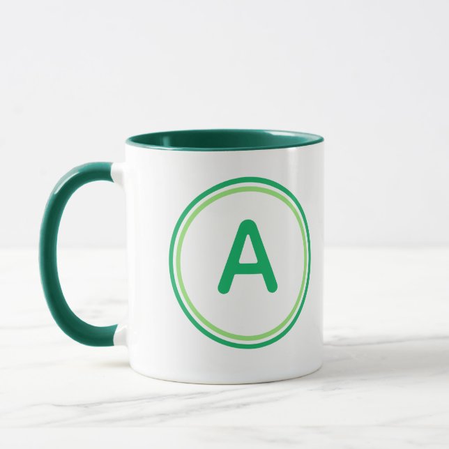 Rund bokstavsalfabet Grön cirkeldesign Mugg (Vänster)