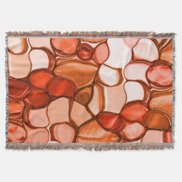 Rund nyven form såsom frön, koralltoner och rött filt