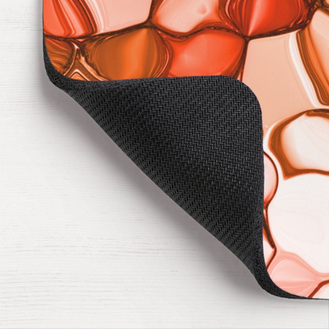 Rund nyven form såsom frön, koralltoner och rött musmatta (Hörn)