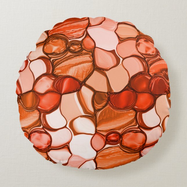 Rund nyven form såsom frön, koralltoner och rött rund kudde (Framsidan)