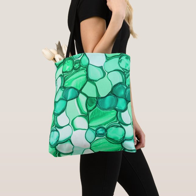 Rund som stenar i grönt till mynning tygkasse (Närbild)