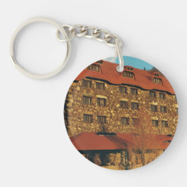 Rundan Keychain med dungen parkerar
