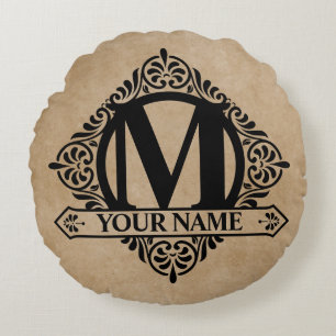 Runt kuddfodral med utsmyckad monogram-design rund kudde