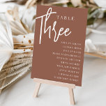 Rust Hand Scripted Bord THREE   Guest Namn Bordsnummer<br><div class="desc">Enkla kort och kort för bordsnummer av chic i jordton, rosa och vita gör en elegant påstående vid bröllop eller vid händelsen. Design innehåller "bord [nummer]" i en ögonetsblandning av klassisk serif och handskrivet skript, med enskild gäst namn under. Utformningen upprepas på båda sidor. Individuellt numrerade kort som säljs separat....</div>