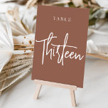 Rust Hand Scripted Bord TRETEEN Bordsnummer<br><div class="desc">Enkla kort och kort för bordsnummer av chic i jordton, rosa och vita gör en elegant påstående vid bröllop eller vid händelsen. Designfunktionerna "bord [nummer]" i en ögonetsande blandning av klassisk serif och handskriven skriptskrift. Utformningen upprepas på båda sidor. Individuellt numrerade kort som säljs separat. Beställ varje bordsnummer var för...</div>