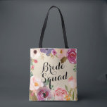 Rustic Boho Watercolor Flowers Bride Squad Tygkasse<br><div class="desc">Vackra, rustiska vattenfärgblommor fungerar som en boho ram för ord "Bride Squad" på den här brudens sida-toten som ger en underbar gåva till dina brudtärnor. Anpassa med ditt brudgumms namn längst bak. Modern kalligrafi lägger till en trendig i snyggten till den här klassiska designen från Kattunge Paj Prints. Du kan...</div>