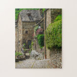Rustic Houses Byggnad Belcastel Frankrike Travel Pussel<br><div class="desc">Det här scenpusslet har roststenshus i det historiska Belcastel,  Aveyron i Frankrike #trip #äventyr #belcastel #aveyron #frankrike #jigsawpuzzle #gift #roligt #stockingstuffers #spel #cobbles #blommigt</div>