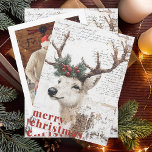 Rustic jul Winter Reindeer<br><div class="desc">Det här julkortet är ett rejält exempel på en hjort som är försedd med en gräs och en röd bäddkrans på sina tändare. Bakgrunden har en vintage som textureras stil med handskript, och "God jul" markeras med fet röd text. Det är perfekt att lägga till en varm, mysigt helgdag till...</div>