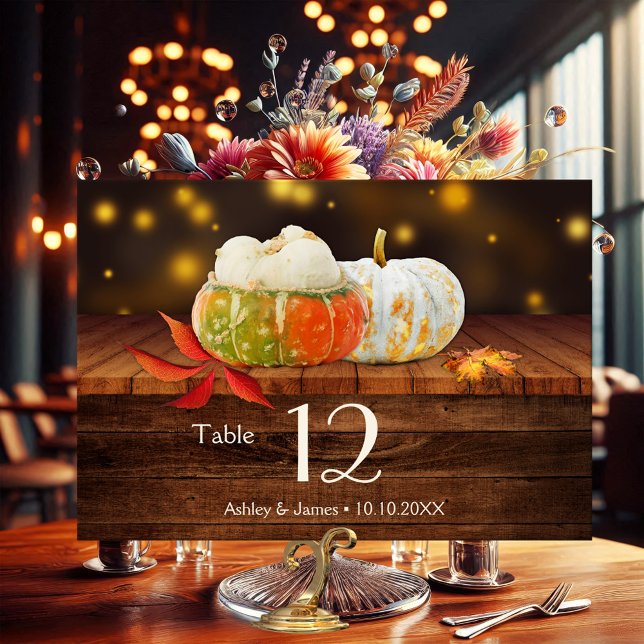 Rustic Pumpkins Fall Wedding Bordsnummer Card (Table number card featuring colorful pumpkins and fall leaves on rustic wood and sparkling lights )