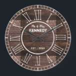 Rustic Roman Numeral Barn Wood Bröllop Stor Klocka<br><div class="desc">Rustisk träklocka med romerska siffror. Trädklockan kan vara personlig med ett par namn och bröllop-datum för att göra den till en unik årsjubileum.</div>