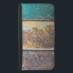 Rustic Struktur med flakfärg på Rusty Metall Samsung Galaxy S5 Plånboksfodral<br><div class="desc">En mobil plånbok med en coola tittar struktur som bakgrund. Vågrät rand av röd gult och grönt som flingar och avtar från en tillförlitlig gammal metall-vägg. Det ser gammalt och vävt ut.</div>