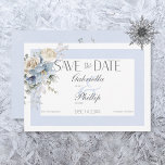 Rustic Winter Frosty Blue & White Blommigt Spara Datumet<br><div class="desc">Vi presenterar vår utsökta vinterkort blommigt bröllop spara datum, firande i kärlek mitt under säsongens fantastiska skönhet. Med sin isig blå och vit dubbla ram är denna inbjudan elegant och sofistikerad. Mjuka blåa och vita blommigtar på vintern, med delikata beröringspunkter av gult, tan och grönt, skonar de motsatta hörnen av...</div>