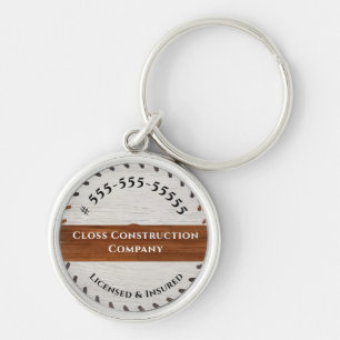 Rustic Wood Tone Saw Construction Business logotyp Rund Silverfärgad Nyckelring