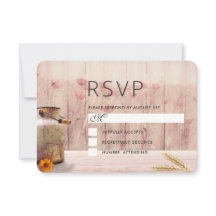 Rustik bröllopsmjölkburk med vete och blommor