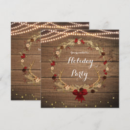 Rustik julkrans med horn i trä och ljus inbjudningar