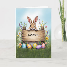 Rustik teckenbunny i gräs med Påskägg Kort