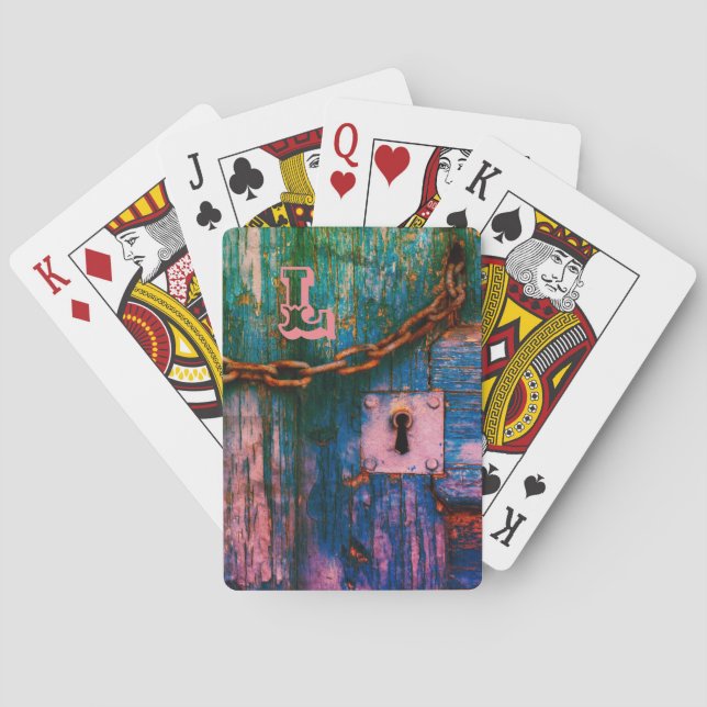 Rustiska trädörr, nyckelhål och köldkort casinokort (Baksidan)