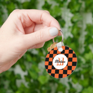 Rutiga rutor svarta och orange retro monogram nyckelring