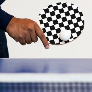 Rutigt vitt och svart pingisracket