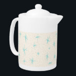 Rymdåldern turkos Starbursts Tea Pot<br><div class="desc">Den här Space Age Turcos Starbursts Tea Pot har blå stjärnor på en grå bakgrund med guld färgad-spekkler. Med inspiration från en klassisk medelårskål i mönster har detta mönster ett äkta vintage. Den godhet retro-kitschy får dig att känna dig som om du har snubblat över en loppmarknadsskatt. Mönster kommer att...</div>