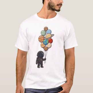 Rymdfarare som håller ballong i form av planet frå t shirt