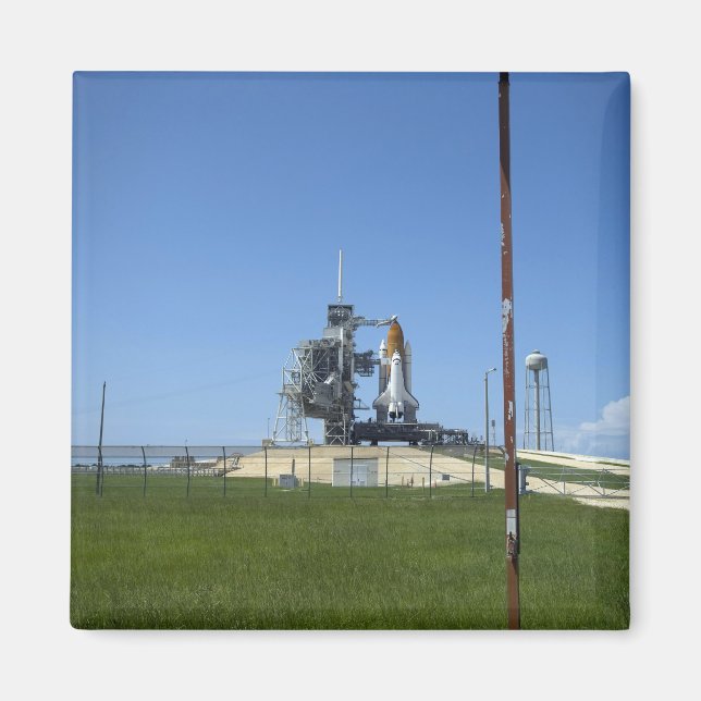 Rymdpendelns ände är inramad av en vindruta magnet (Framsidan)