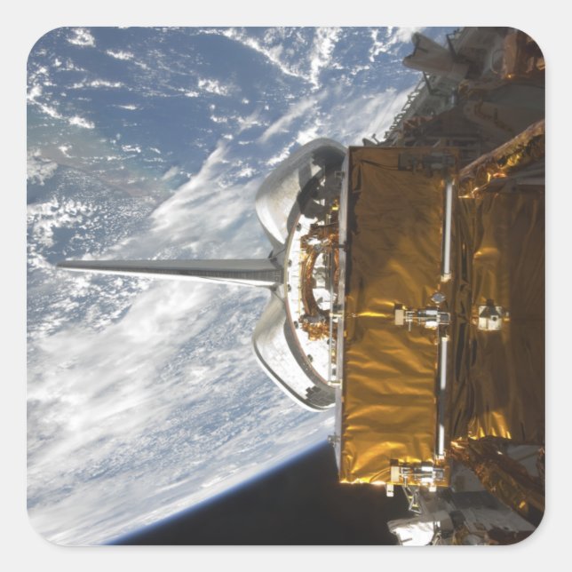 Rymdpendelns nyttolastfack har fallit fyrkantigt klistermärke (Framsida)