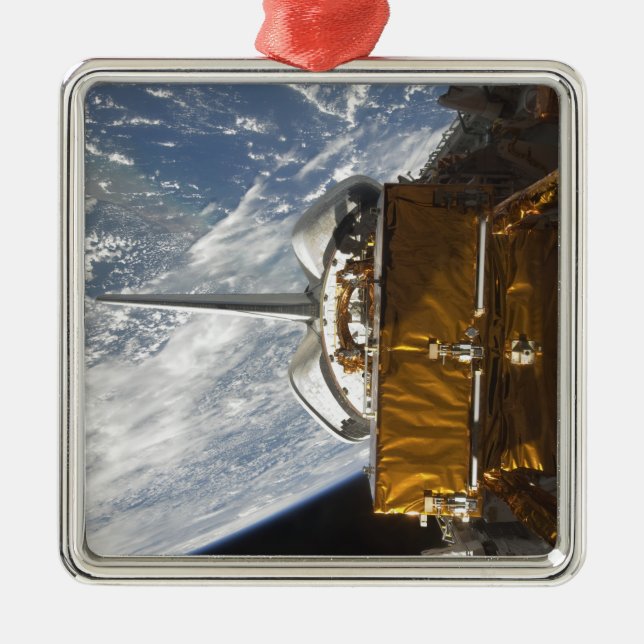 Rymdpendelns nyttolastfack har fallit julgransprydnad metall (Framsidan)