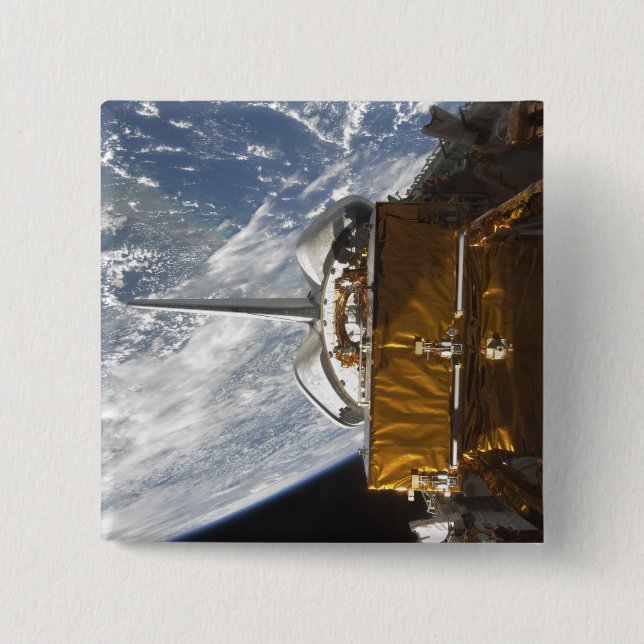 Rymdpendelns nyttolastfack har fallit knapp (Framsida)